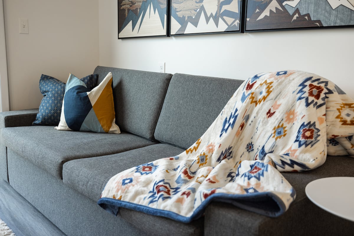 Open living area with fireplace and Samsung TV